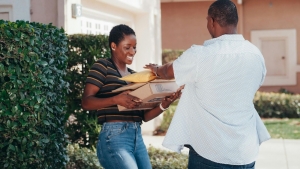 Delivery Worker Handing Over Package